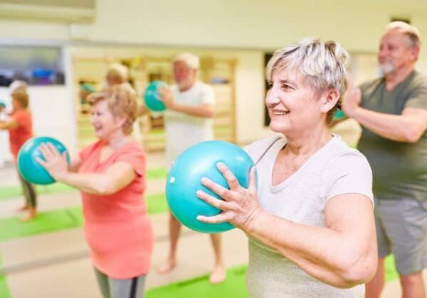 A group of seniors participating in a group exercise class to keep themselves active during the winter months.