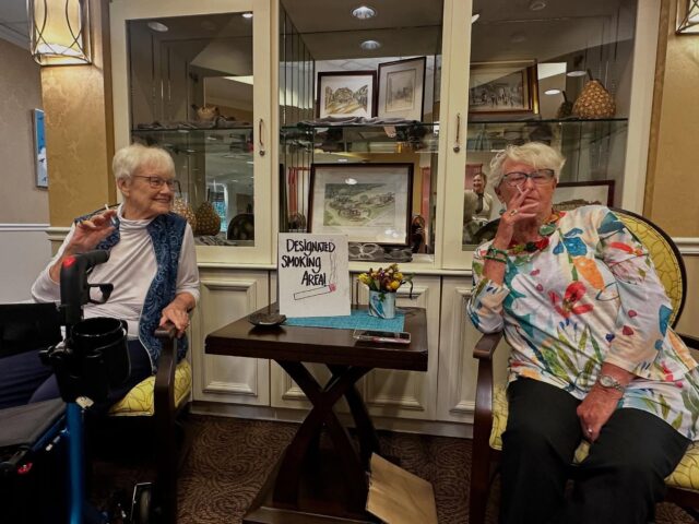 🚭😂 Who says you can’t have a little mischief in your day?

Last week, a few of our residents staged a “smoke out” in the lobby…with 𝗰𝗮𝗻𝗱𝘆 𝗰𝗶𝗴𝗮𝗿𝗲𝘁𝘁𝗲𝘀! One of the ladies spotted them while shopping downtown Chelsea and thought, “We can have some fun with these!” Soon enough, ash trays were set out, candy cigarettes were in hand, and they even posted a sign declaring it a “𝗗𝗲𝘀𝗶𝗴𝗻𝗮𝘁𝗲𝗱 𝗦𝗺𝗼𝗸𝗶𝗻𝗴 𝗔𝗿𝗲𝗮” – despite our entire campus being non-smoking.

Their creativity had everyone laughing. A couple shared stories about their real smoking days, including one who was hypnotized to quit.

👉 Candy cigarettes were so cool when we were kids – do you remember these?

💭 Just another example of how our residents bring humor, nostalgia, and joy to everyday life here. ❤️